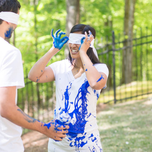 gender reveal paint fight photo session in Roswell GA