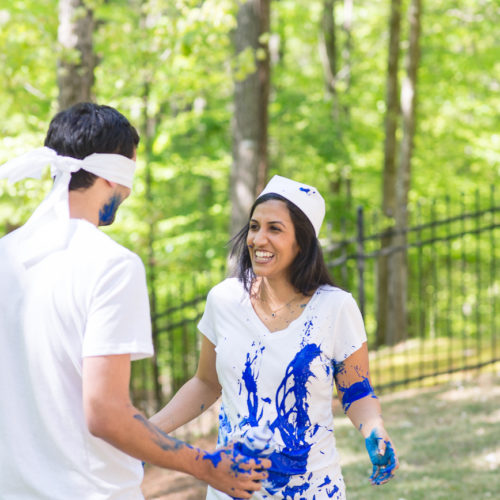 gender reveal paint fight photo session in Roswell GA