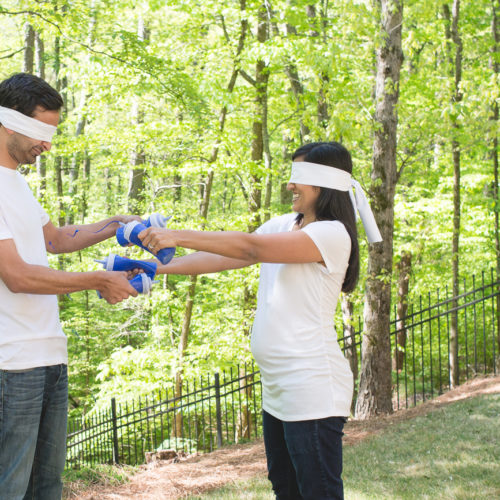 gender reveal paint fight photo session in Roswell GA