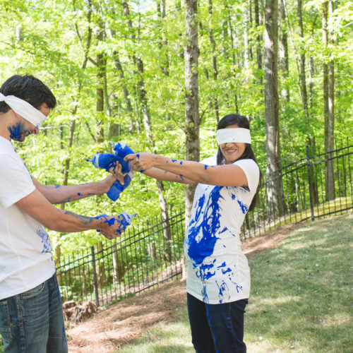 gender reveal paint fight photo session in Roswell GA