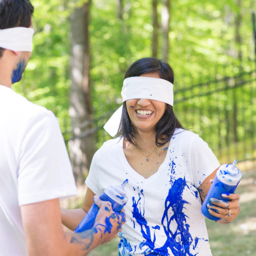 gender reveal paint fight photo session in Roswell GA