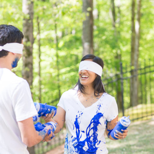 gender reveal paint fight photo session in Roswell GA