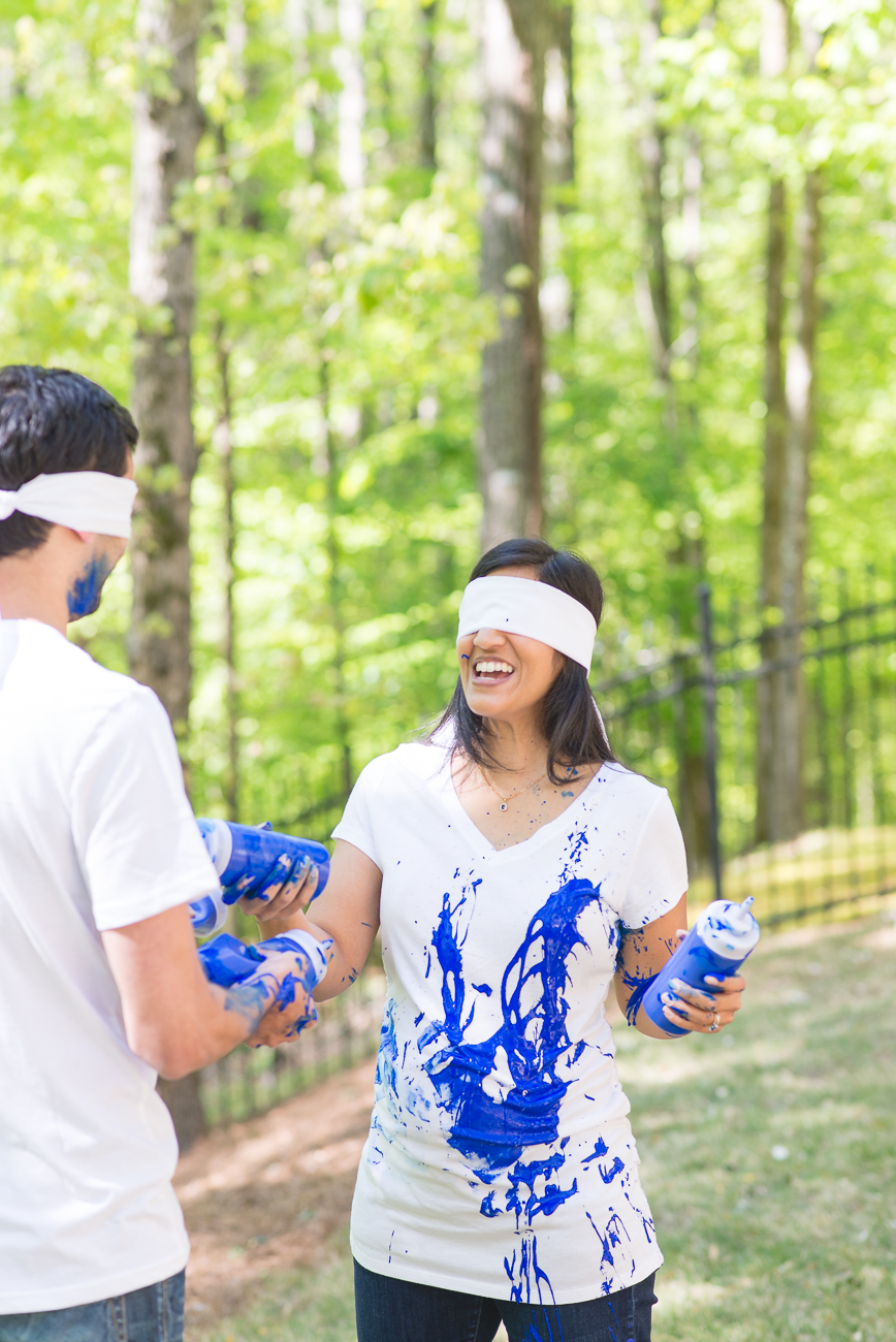 gender reveal paint fight photo session in Roswell GA