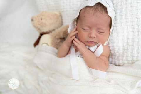 Photo from a newborn portrait session taken by Cumming GA newborn photographer.