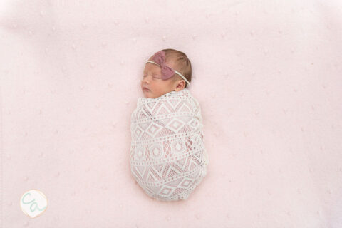 Photo from a newborn portrait session taken by Cumming GA newborn photographer.