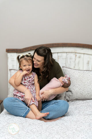 Photo from a newborn portrait session taken by Cumming GA newborn photographer.