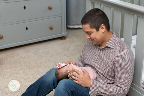 Photo from a newborn portrait session taken by Cumming GA newborn photographer.